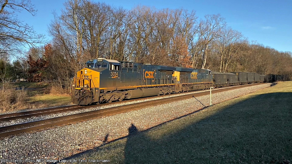 CSX 3034 leads K182.